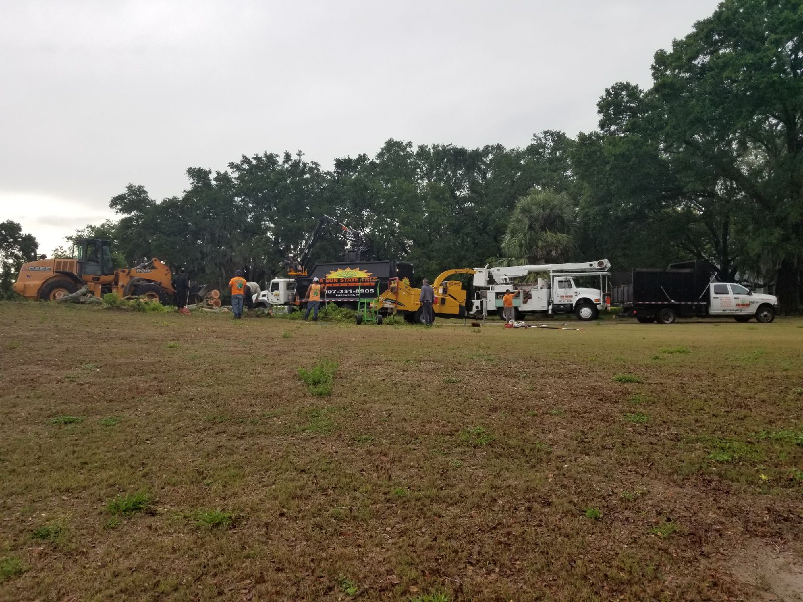 Crew members clear Errol Estate golf course ninth hole for redevelopment