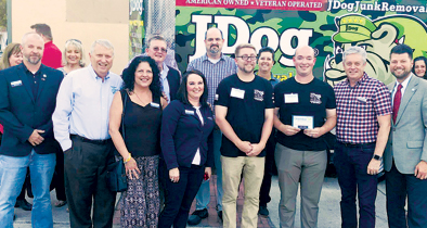 JDog Junk Removal ribbon cutting