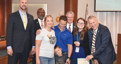 Apopka City Hall gold lights honor Childhood Cancer Awareness Month