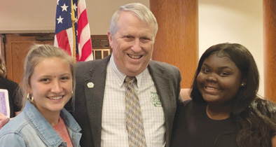 Apopka High School SGA President Faith Evans Vice President Barbara Clerger historical fact of the day at city council meeting