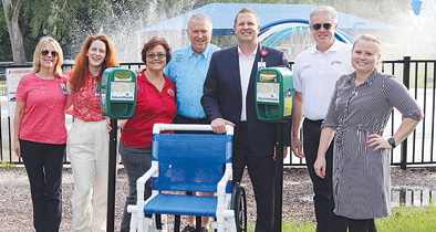 AdventHealth Apopka hospital donated portable wheelchair Apopka splash pad Kit Land Nelson Park