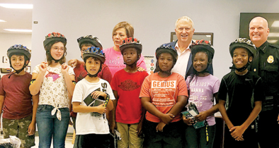 Apopka Police Department gives free bike helmets to Lakeville Elementary