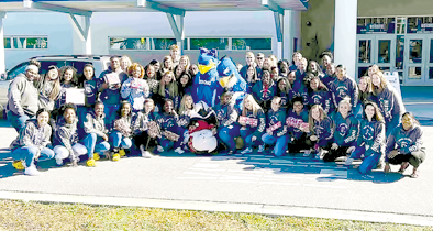 Apopka High School SGA donate toys Phillis Wheatley Elementary School