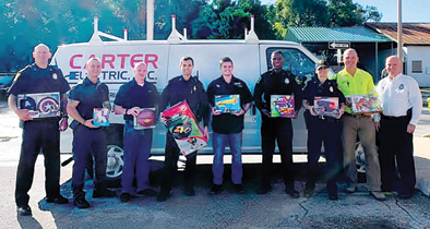apopka Carter Electric Inc donates toys christmas 2019