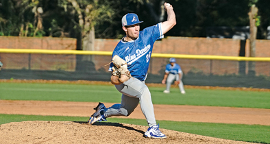 The Apopka Blue Darter baseball team's Wyatt Jaggers throws a pitch in Apopka's game against Olympia High School.
