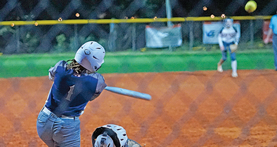 Taylor Smith of the Apopka Softball team hits a homerun.