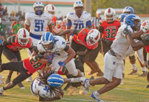 Apopka's Elijah Frazier barrels through a wall of Jones defenders on his way into the end zone on Friday, May 23.