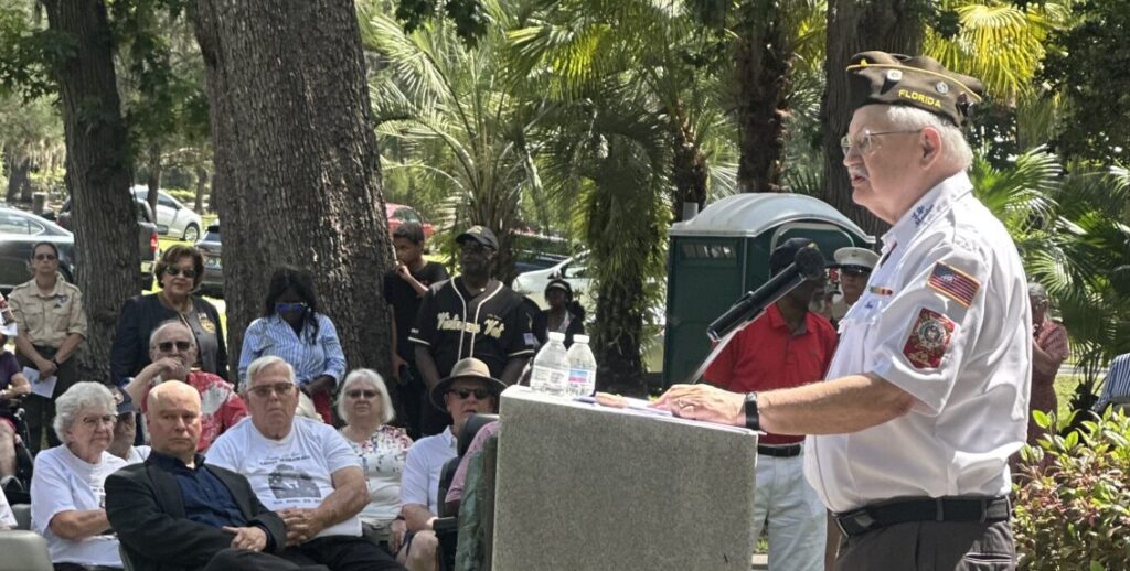 Steve Deviese, member of the VFW Post 10147 Apopka/Altamonte Springs, delivers a keynote speech to a crowd at the Edgewood-Greenwood Cemetery in Apopka on May 26.