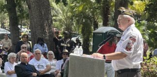 Steve Deviese, member of the VFW Post 10147 Apopka/Altamonte Springs, delivers a keynote speech to a crowd at the Edgewood-Greenwood Cemetery in Apopka on May 26.