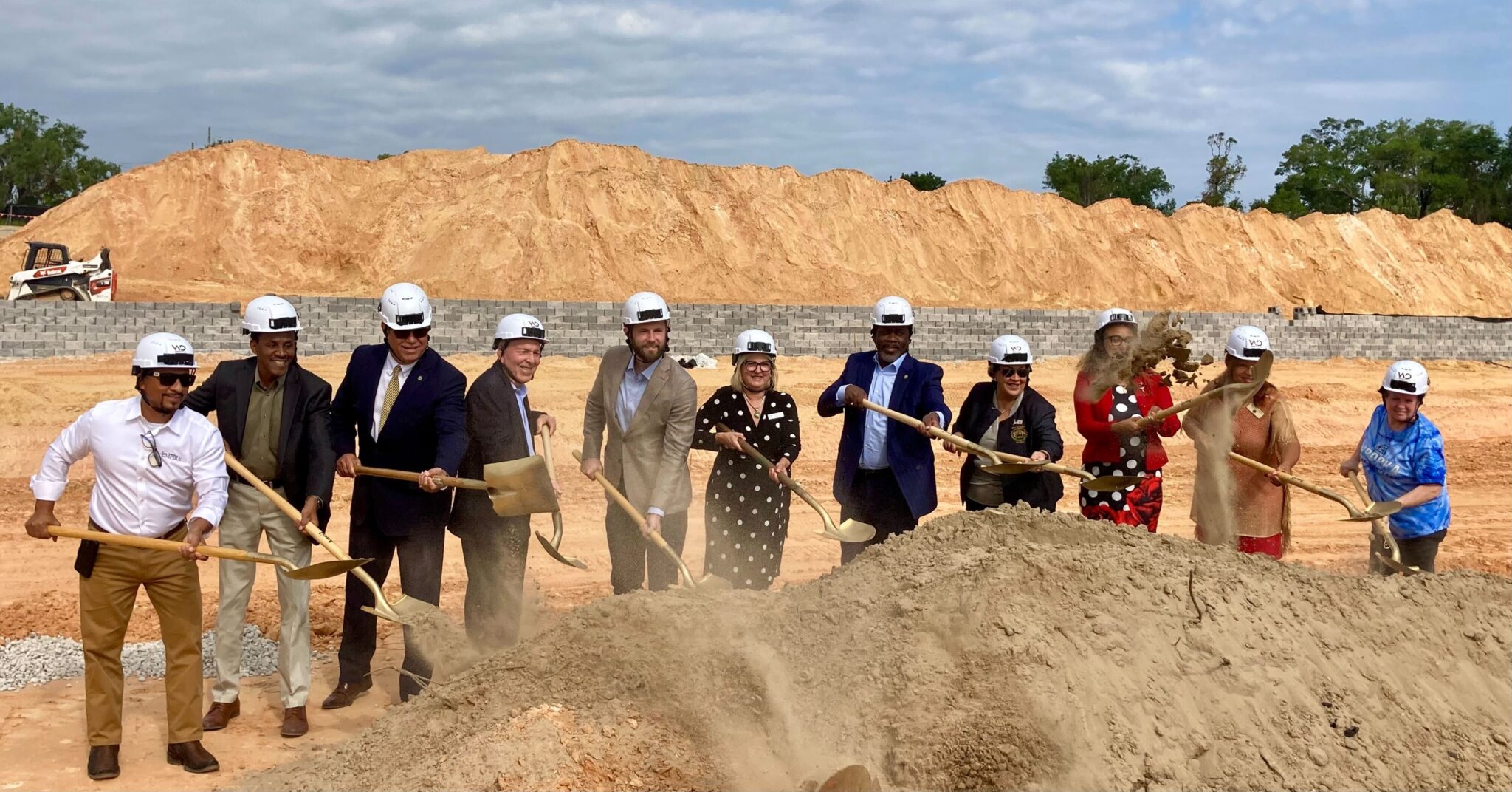 Mayor Demings, Commissioner Moore, and others at the groundbreaking ceremony.