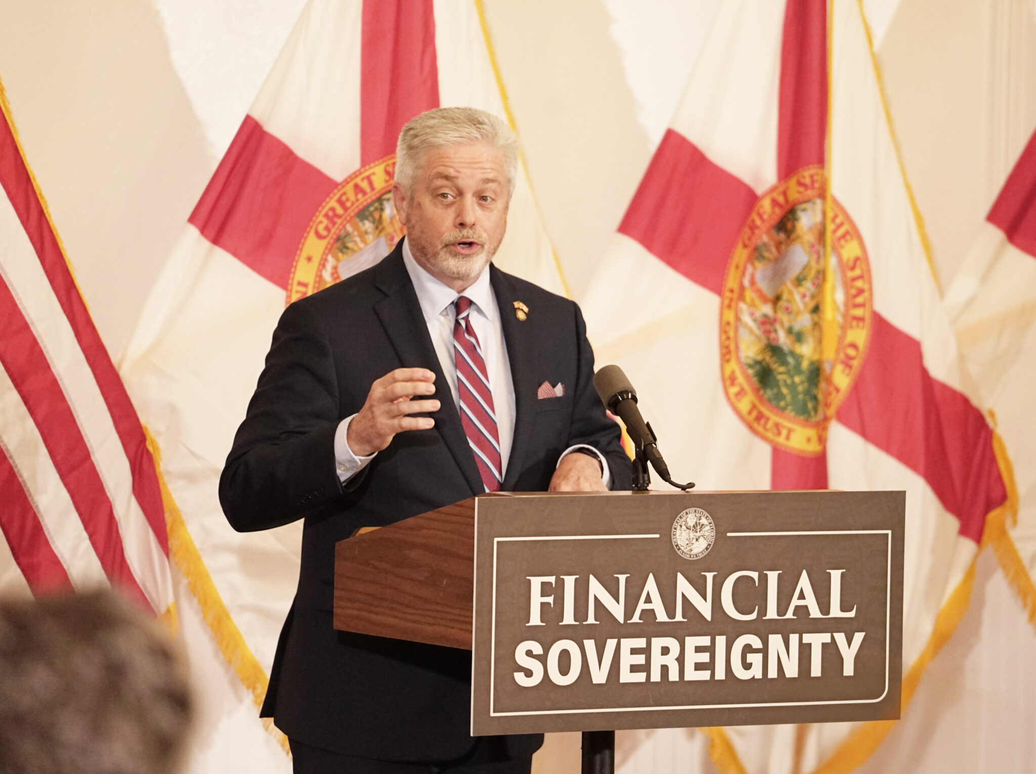 Rep. Doug Bankson speaks at the signing of HB 999.