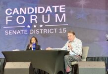 Alan Grayson speaks at the forum.