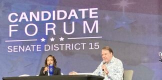 Alan Grayson speaks at the forum.
