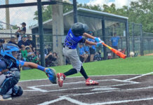 Alejandro Marcelino connects on a single against Dr. Phillips on Saturday, June 14.