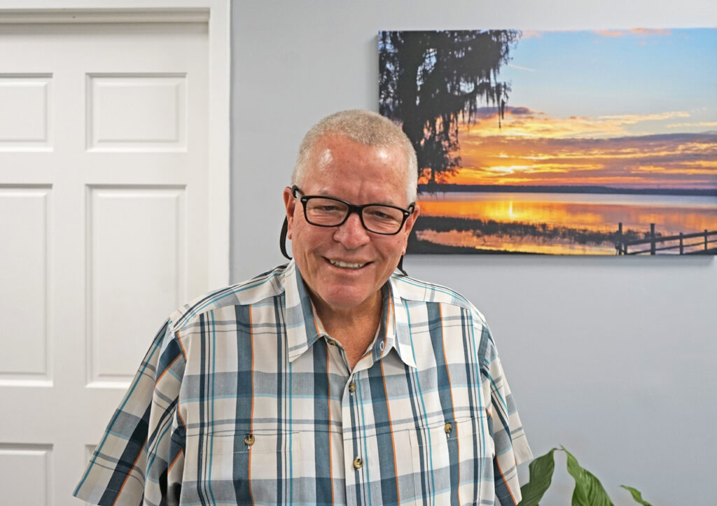 Dave Rankin, pictured at One Florida Bank this week, is all smiles as his long career draws to a close.