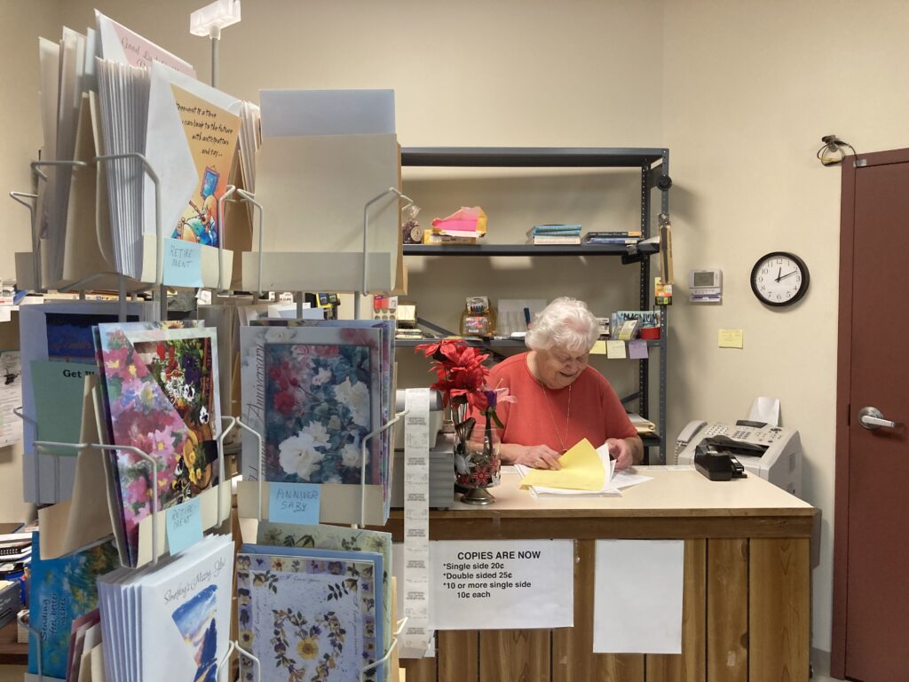 Eileen Ricketson reviews old documents at Apopka Office Supply.