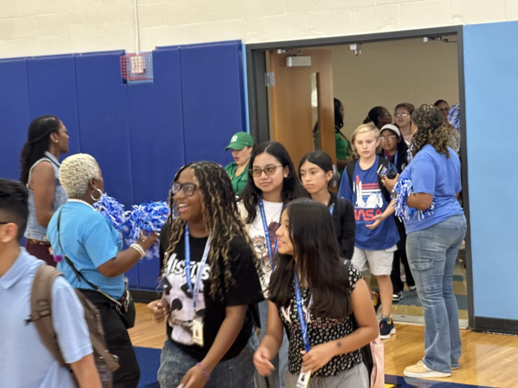 Apopka Memorial Middle School students enter the gymnasium for the Aug. 15 celebration. 