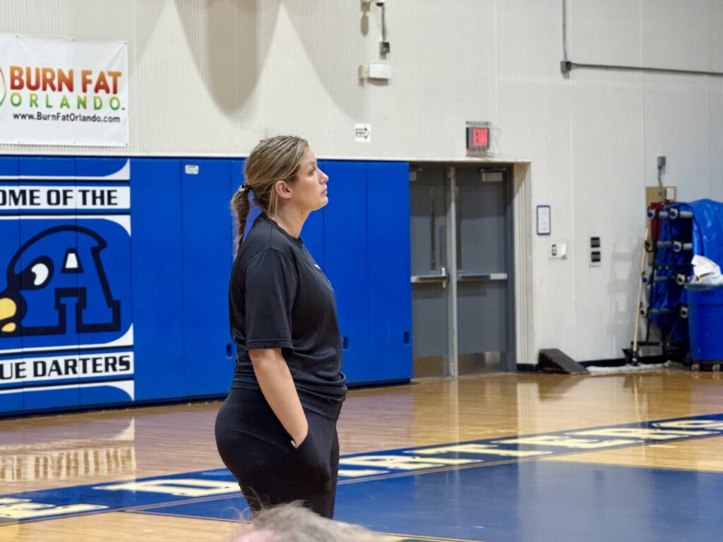 Assistant Coach Sarah Egbers on the sideline.