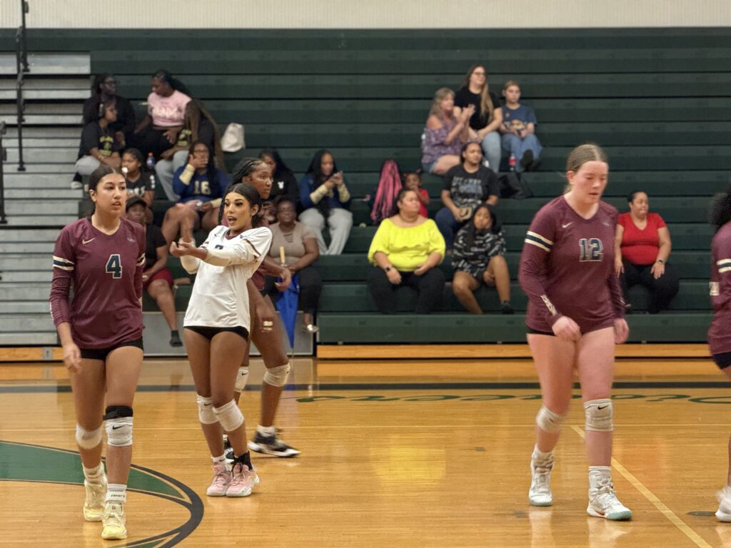 Elyanna Sanchez, Mikayla Rivera, Sarai McFadden, and Avianna Mater after a point.