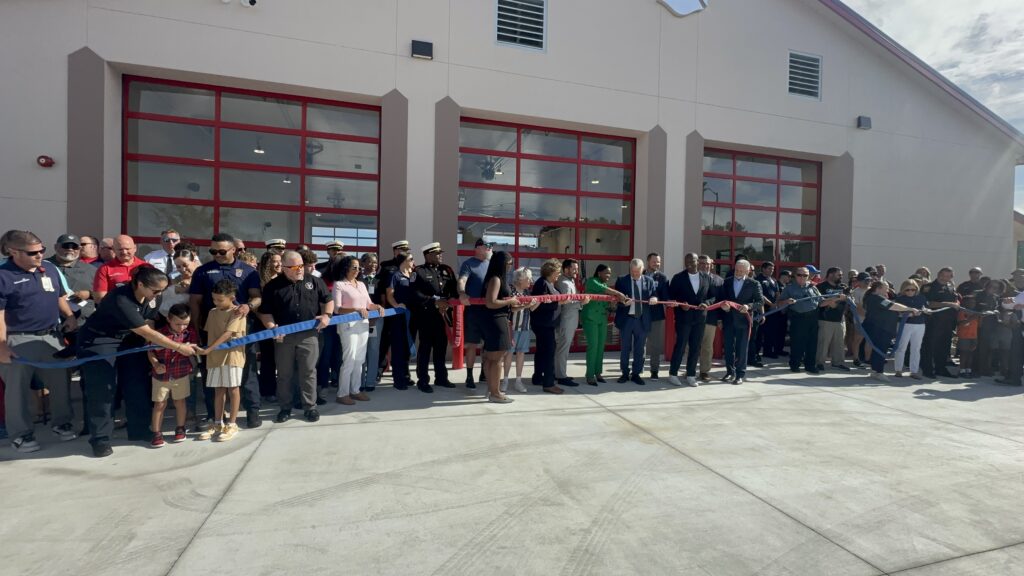 The community gets ready to “uncouple” fire hoses at the permanent Apopka Fire Station 6 grand opening.