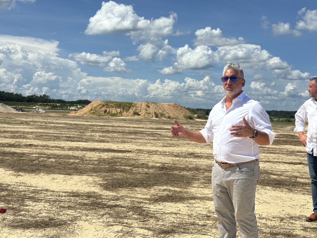 Joseph Beninati, Wyld Oaks founder, gives a site tour on Aug. 13 of the construction site that will become the 215-acre mixed-use development.