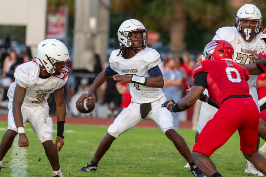Justin Sessler sets to pass Friday night against Edgewood.