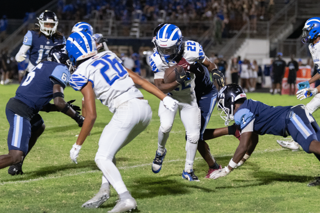 Jakyvion Kemp breaks through tackles.