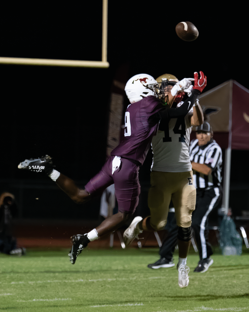 Matthew Beacham breaks up a pass downfield.