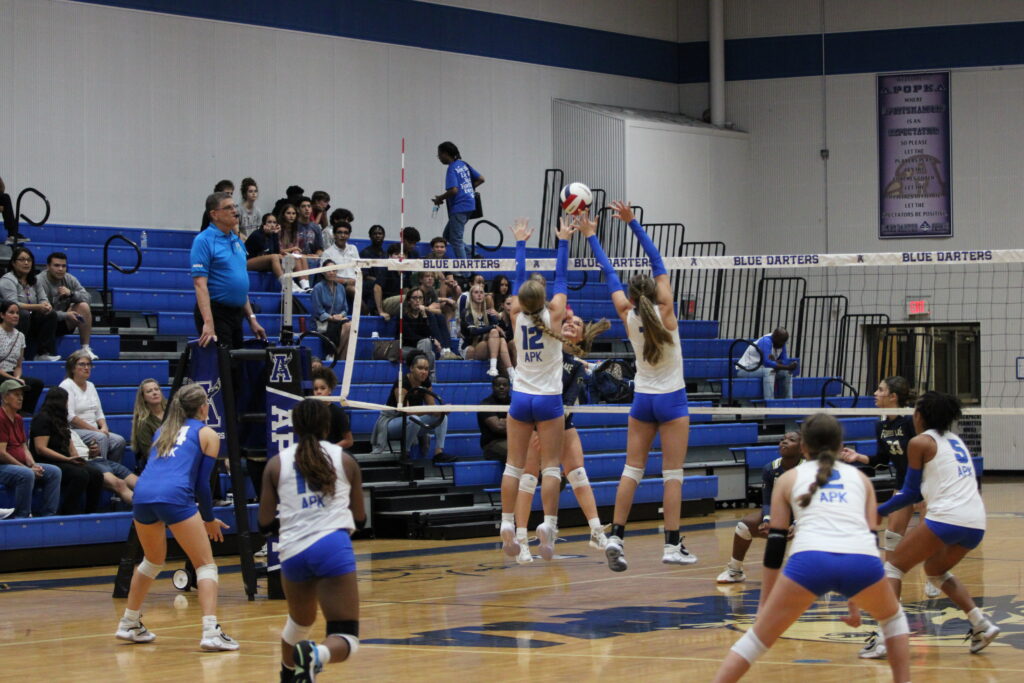 Victoria Polusmak and Madeline Sherrer in position for a block