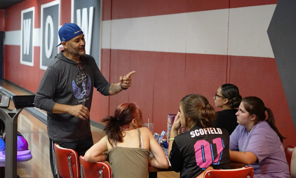 Coach Jason Ramos speaks with his team during a practice on Tuesday of this week.