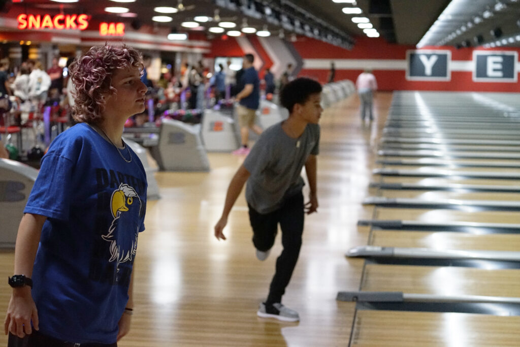 Members of the Apopka bowling team follow through after their throws to see how many pins they dropped.