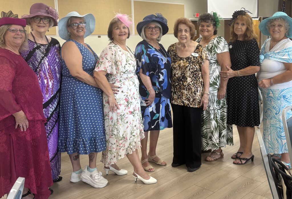 Club President Diane Harrison, Tea Chairman Ginny Iafrate and other members of the Apopka Woman's Club Annual Welcome Back Tea Committee