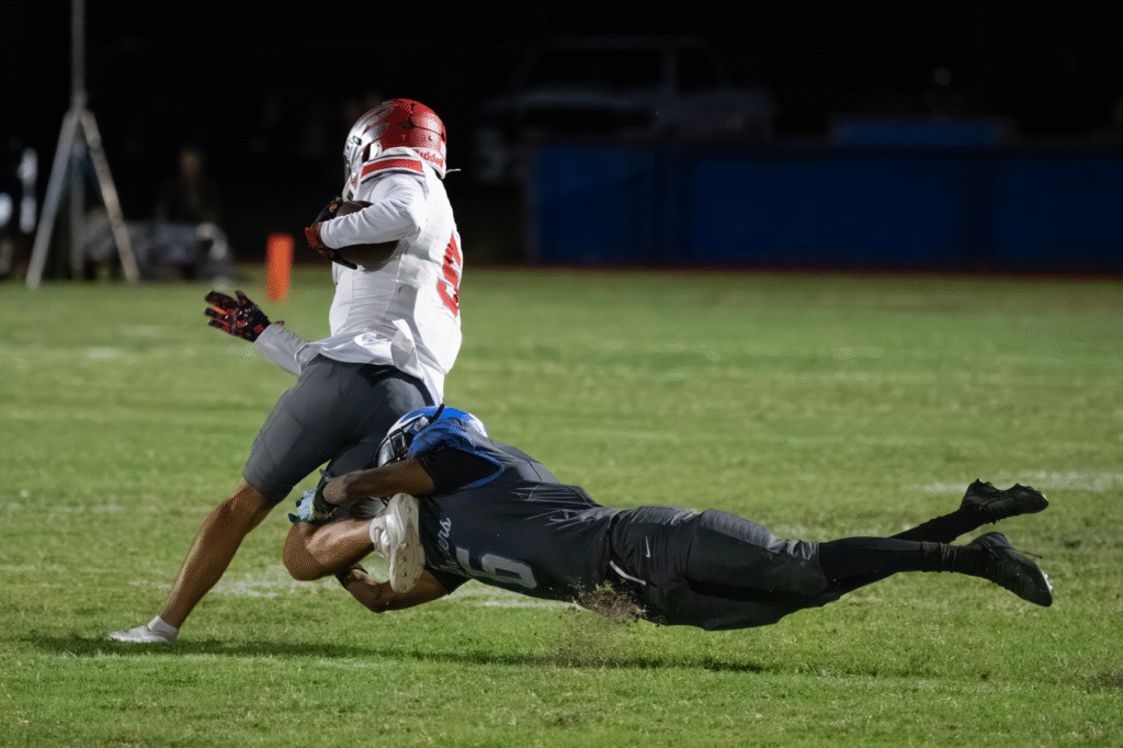 Jaquan Walker dives for the tackle