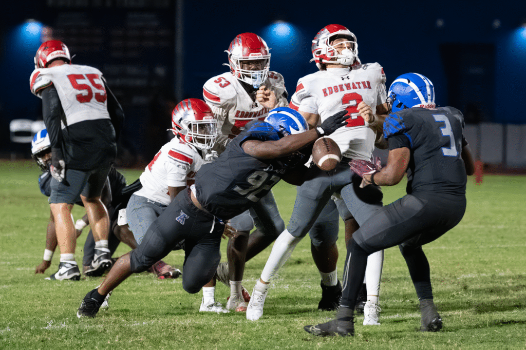 Marcus Young strip sacks the Quarterback.