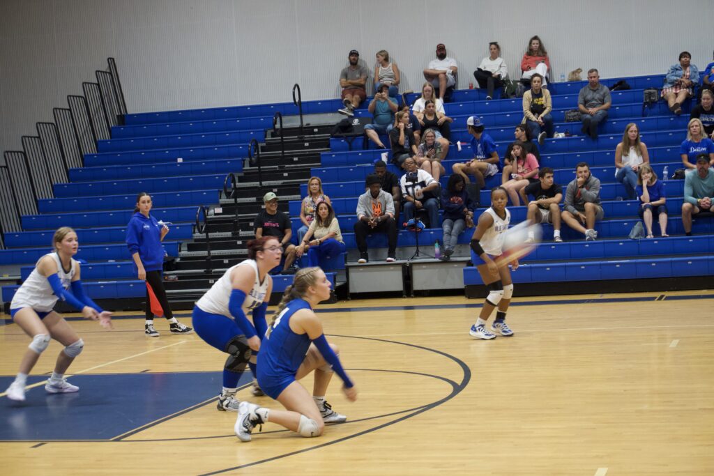 Sydney Bartkin receives a serve.