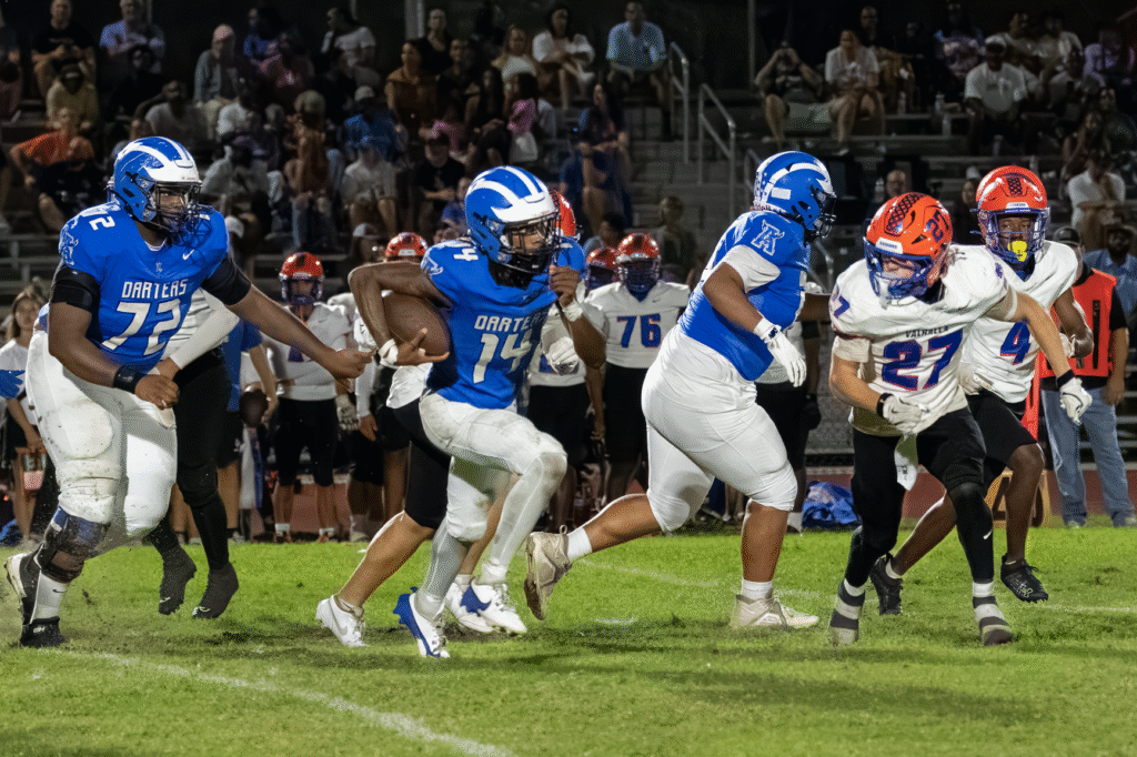 TJ Frazier follows blockers for 8 yard carry