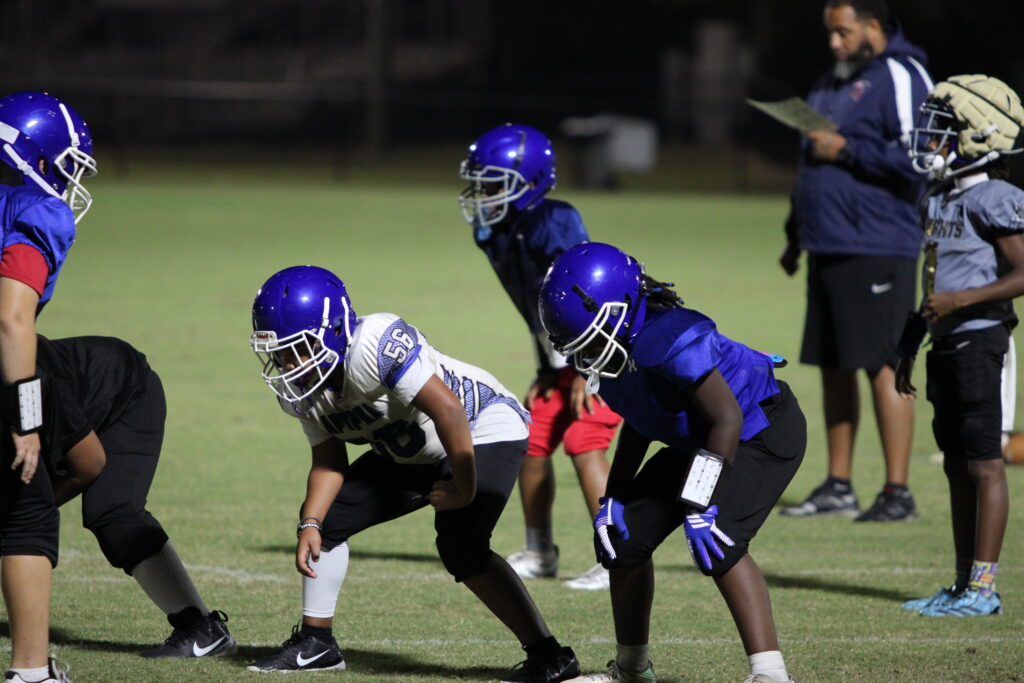 10U lines up to run a play