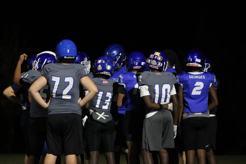 13U's offensive weapons flair high aspirations with helmet stickers