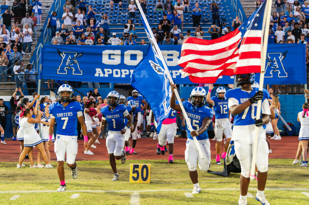 Blue Darters run out of the tunnel for homecoming night
