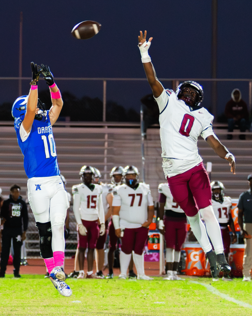 Blake Childs reaches up for the 13 yard reception