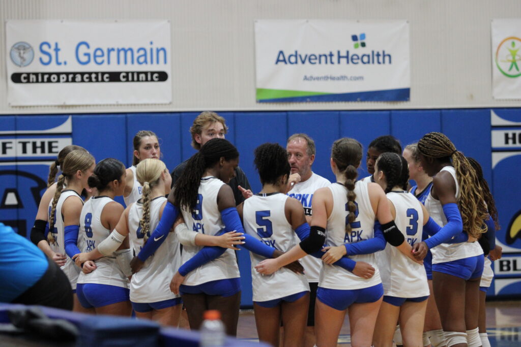 Blue Darters huddle in preparation for set three