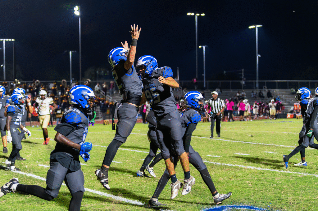 Cody Owens and Titus Martinez celebrate the touchdown