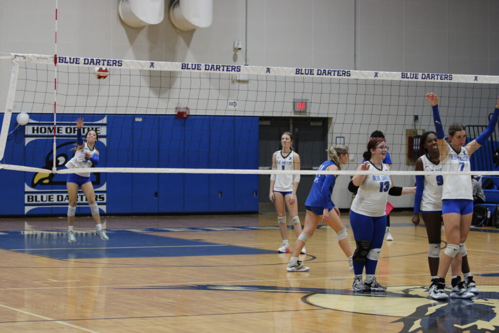 Olivia Ramos on serve in the senior rotation.