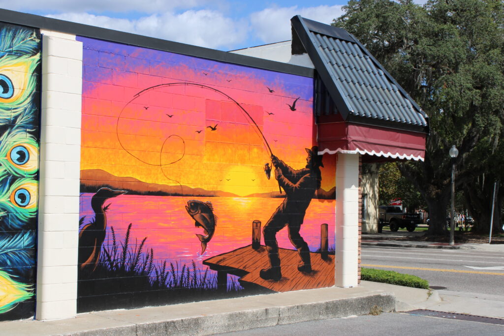 Michael Delgado's Lake Apopka mural before the signing on Saturday