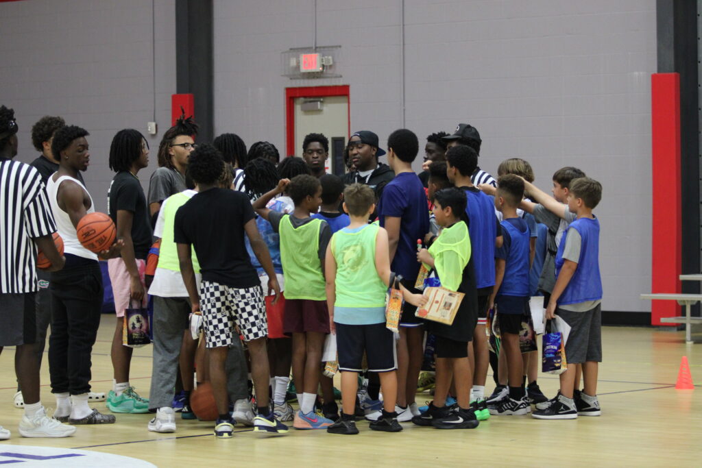 Coach Washingtons motivational huddle to end camp