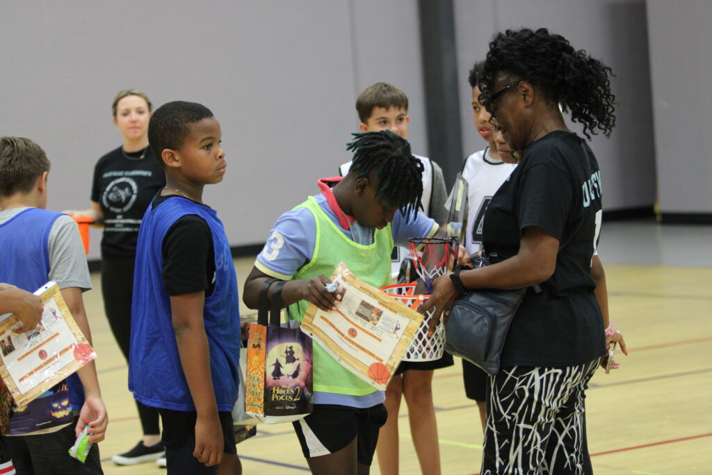 Campers trick or treat from the Hall of Famer Betty Washington