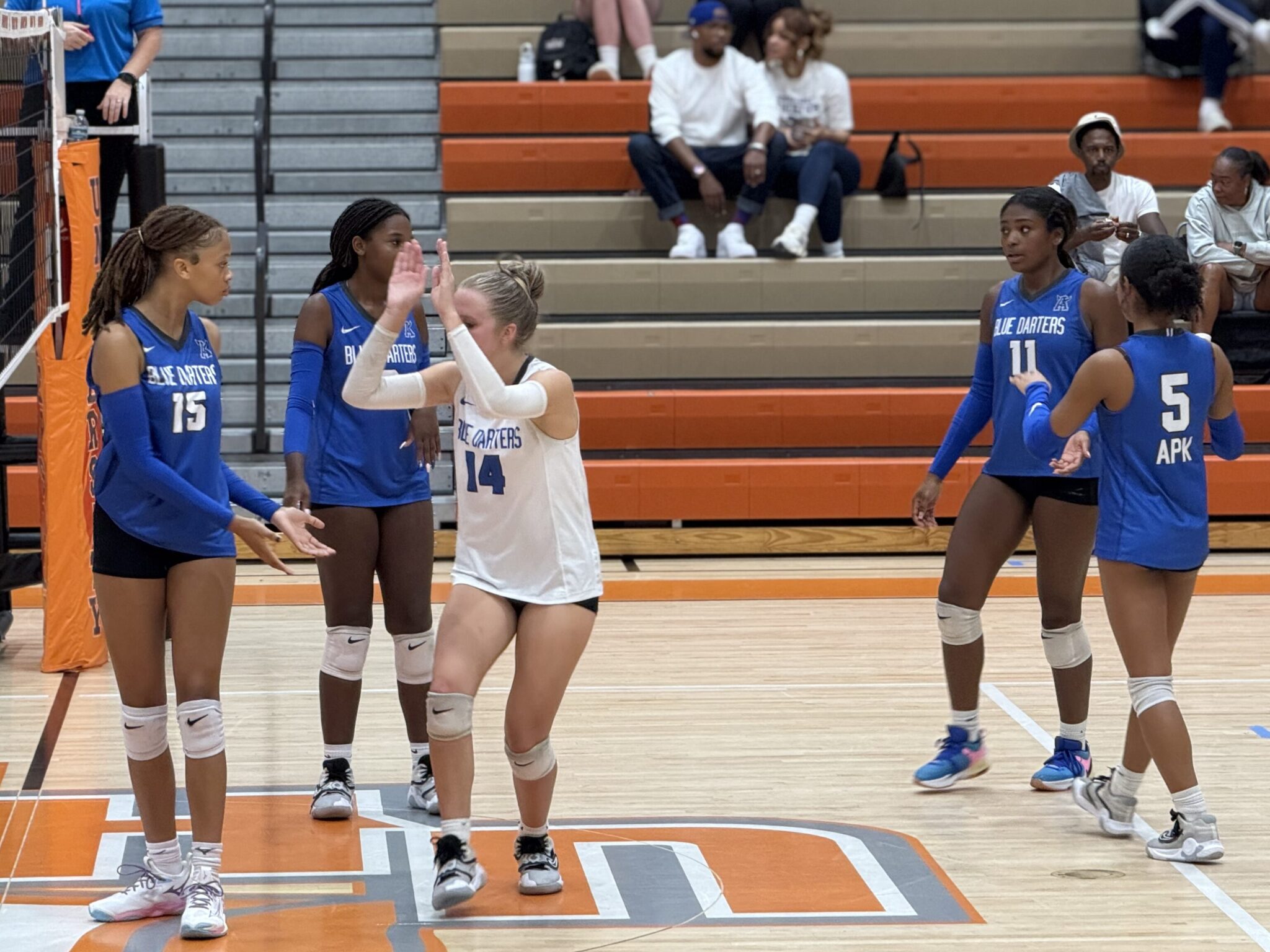 Kierra Taylor and Sydney Bartkin slap hands to start the 2nd set