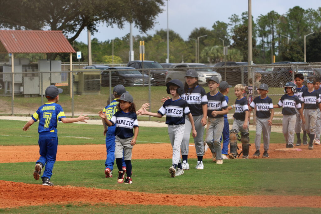 Little Leaguers say "Good Game!"