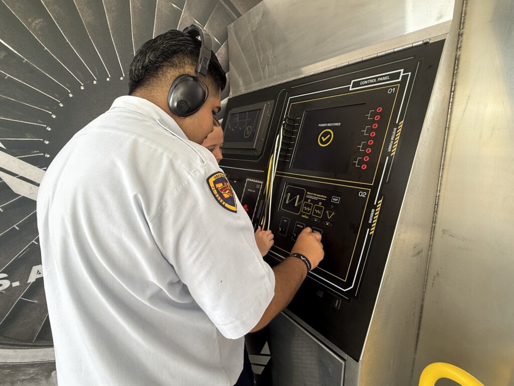 Wekiva High School JROTC cadets Isabella Robinson and Oscar Elisea-Chavez complete a rewiring simulation.