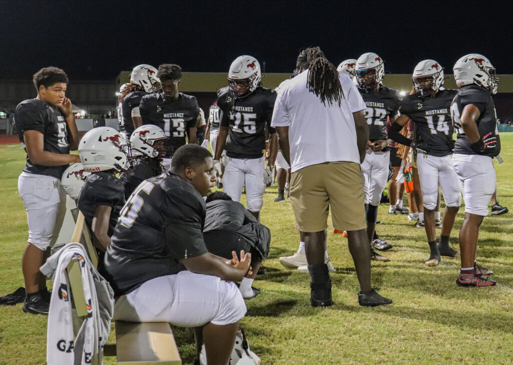 Mustangs getting refreshed at the break.